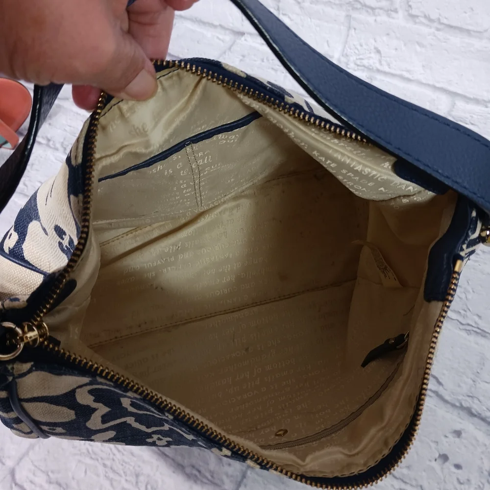 Kate Spade blue and white print canvas hobo bag